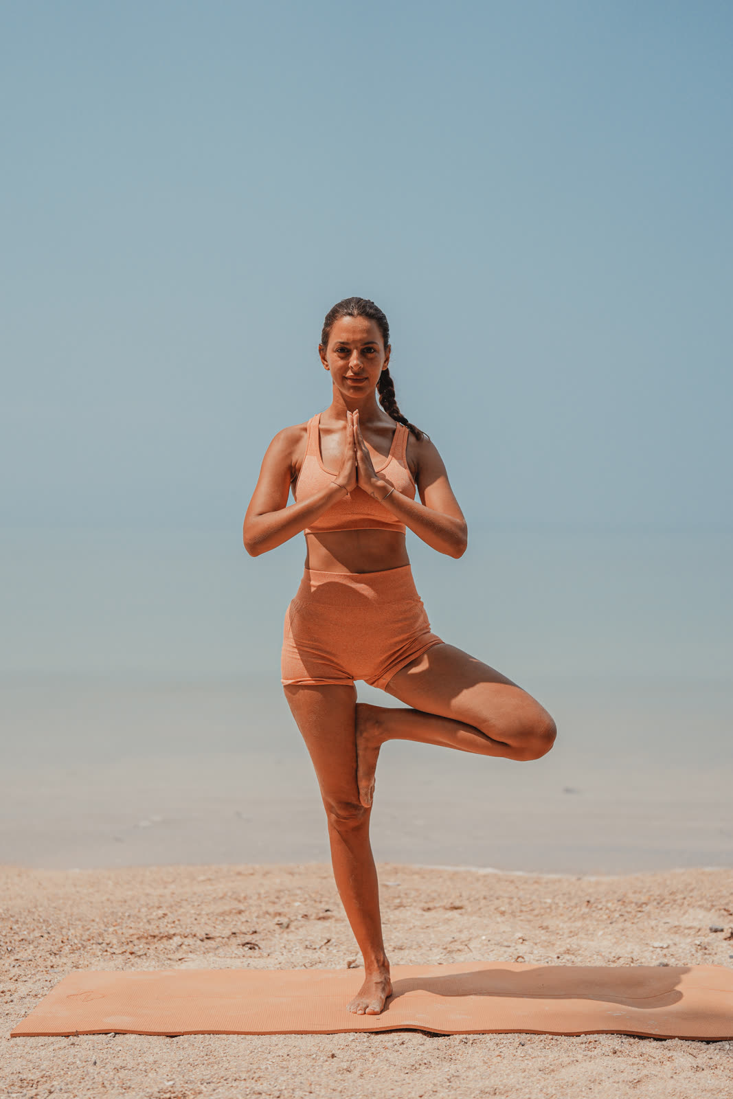 Tree pose on the beach