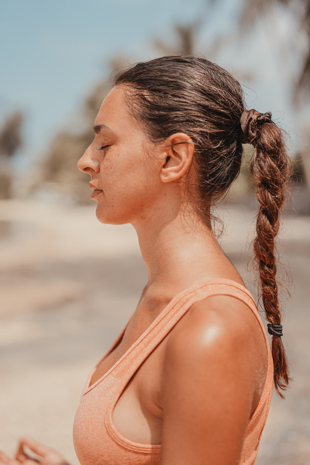 Profile, eyes closed, sea air